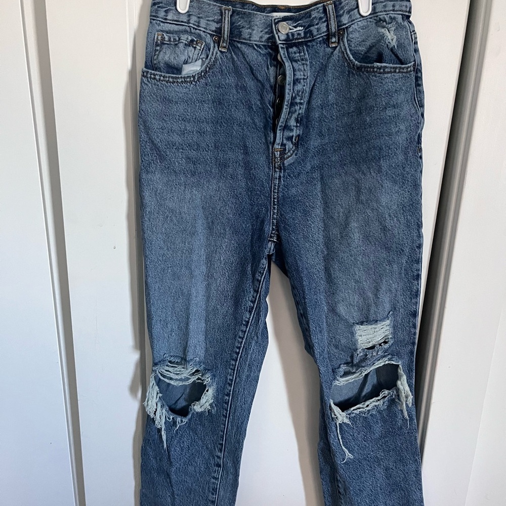 Distressed Blue Jeans